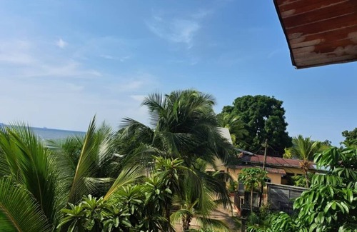 Kribi Hotel | Jacuzzi Suite · Sea balcony · Beach · B’fast opt ·