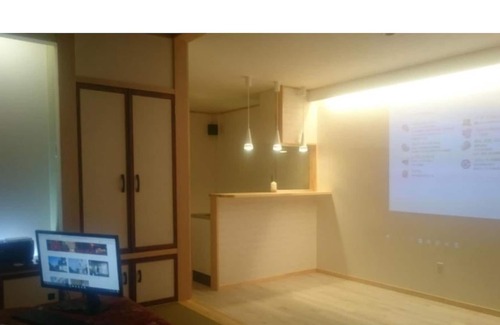 Goshogawara House | Japanese and Western style modern suite apartment / Goshogawara Aomori