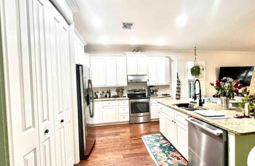 Riverwalk House | JUBA’S NEST NEAR BEACH COASTAL HOME