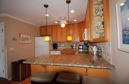 Avalon Condo | Just two short blocks to the beach, Enjoy parking your car in the off-street designated parking space and walking to restaurants and the recreation area.