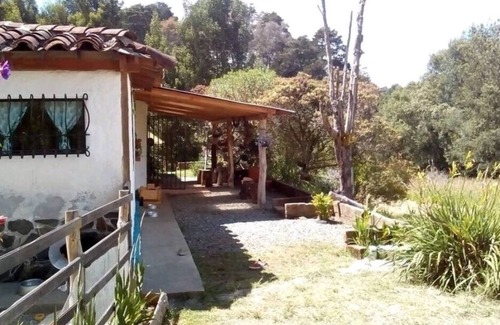 Guarne Cabin | La guaca mud house cabin with chimney, close to Parque Arvi