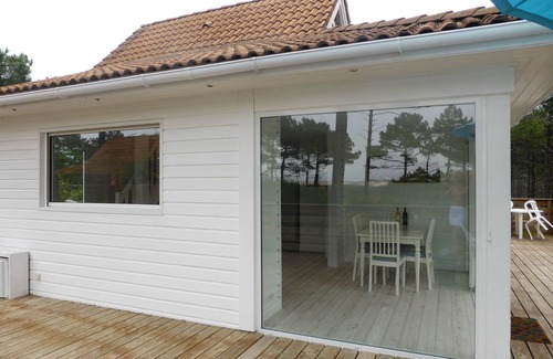 Le Porge Ski Chalet | La Jenny Colibri Chalet with Ocean Views in Naturiste Village