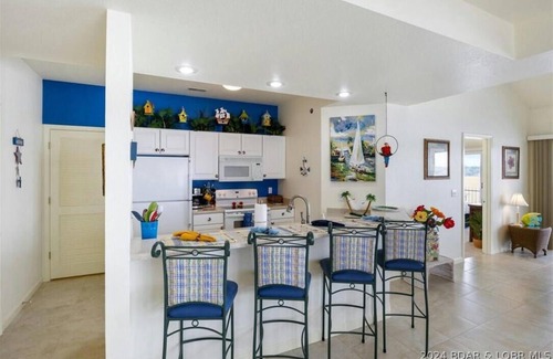 Lakeland Condo | Lake views for miles! 3 BR, 2 BA, 3rd floor condo in Harbour Towne, Lake Ozark.