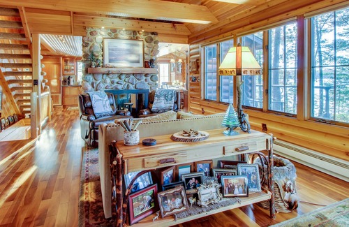 Eagle River Cabin | Lakefront cabin with WiFi, W/D, fireplace, furnished deck, firepit, & dock