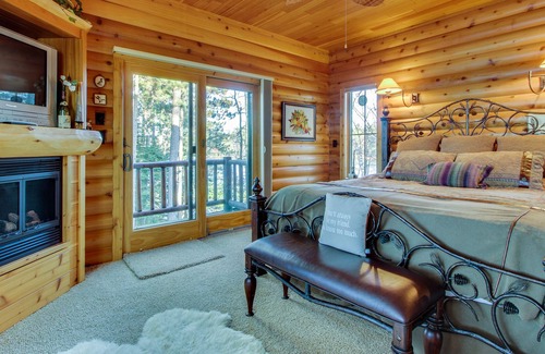 Eagle River Cabin | Lakefront cabin with WiFi, W/D, fireplace, furnished deck, firepit, & dock