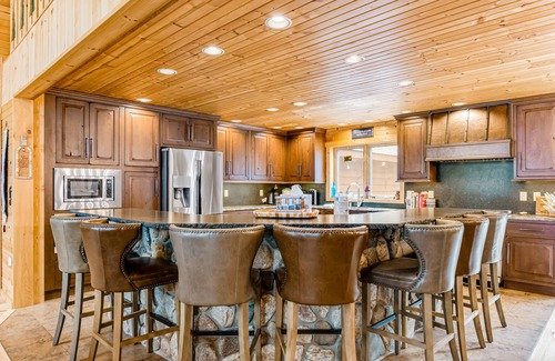 Conover House | Lakefront home with game rooms, dock, kayaks, private beach, fireplace, firepit