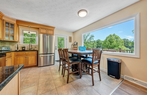 Huddleston House | Lakefront Home with Hot Tub