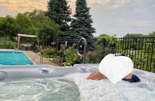 West Omaha House | Lakefront walk-out basement with private Pool, Hot Tub, Sauna and Pool Table 🏖
