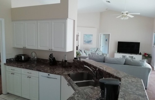 Long Meadow Villa | Lakeside home on golf course - south facing pool & deck - Rotonda West, Florida