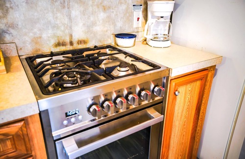 Eddyville Cabin | Lakeside Place 2 (Sleeps 1-4) - Tiny living space with a queen and full size beds overlooking Lake Barkley.