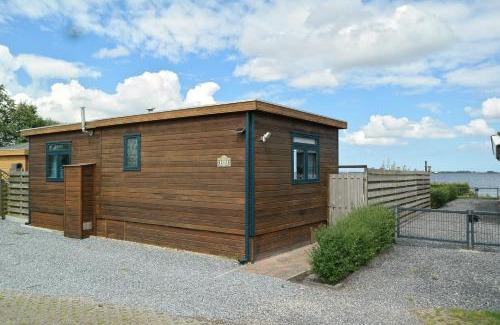 Anjum House | Lakeview 6 pers Holiday home Aurora with fenced garden, whirlpool and sauna