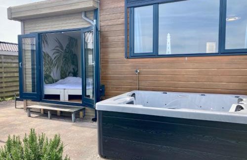 Anjum House | Lakeview 6 pers Holiday home Aurora with fenced garden, whirlpool and sauna