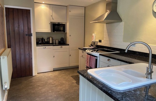 Leyburn Cottage | Large Stone Cottage In Mature South Facing Garden Enjoying Stunning Views