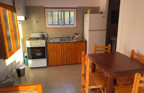 Capilla del Monte House | Las Piedras Disconnecting view of the hill