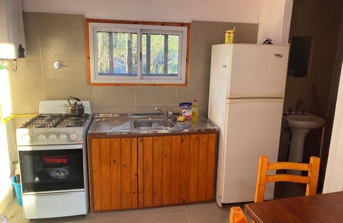 Capilla del Monte House | Las Piedras Disconnecting view of the hill