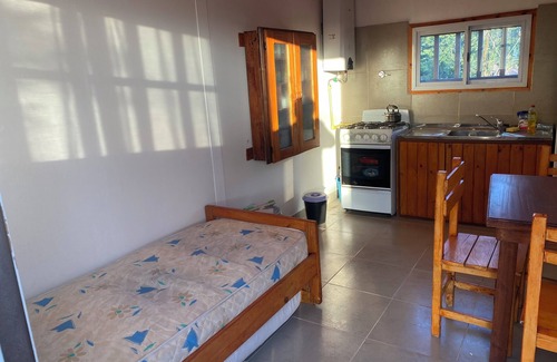 Capilla del Monte House | Las Piedras Disconnecting view of the hill