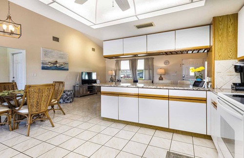 Lochmoor Waterway Estates House | Lazy Palm Retreat Heated Pool Jacuzzi Gulf Canal