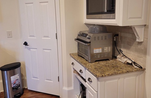 Suwanee House | Live in a mansion near the city, offering a resort-style setup.