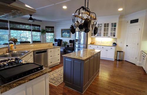 Suwanee House | Live in a mansion near the city, offering a resort-style setup.