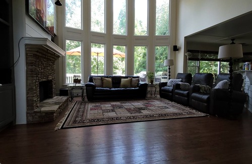 Suwanee House | Live in a mansion near the city, offering a resort-style setup.