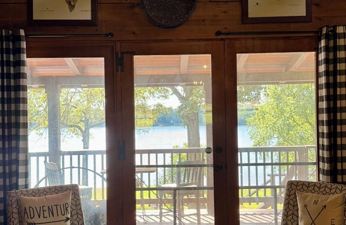 Livingston County Cabin | Log cabin with walkout basement and loft located on Ohio River’s edge.