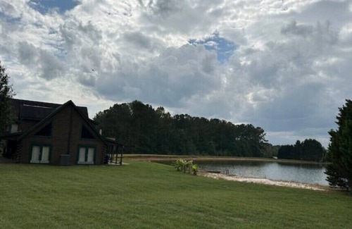 Bowdon Junction House | Log Castle and a Spring Fed Lake