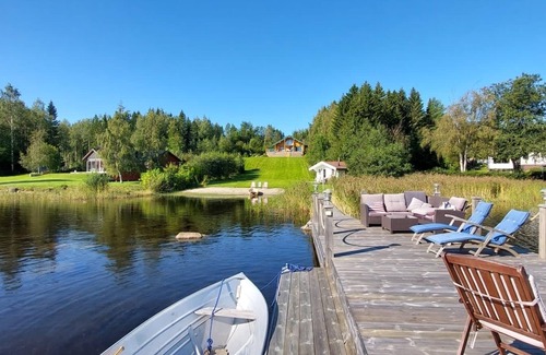 Lorudden Villa | Log house with private beach and own dock incl. boat