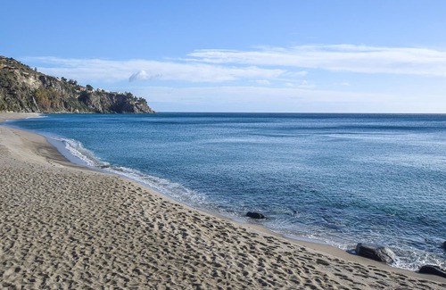 Santa Maria del Mare Torrazzo Apartment | Look forward to a beautiful view of the sea in this beachfront vacation rental.