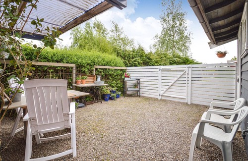 Kongsnæs House | Look forward to a vacation in this child-friendly vacation home with a beautiful fenced garden.