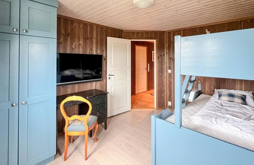 Svingvoll House | Look forward to a fantastic view of the mountains from this comfortable vacation home.