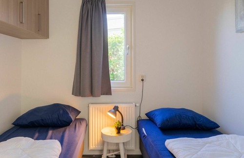Municipality of Nunspeet House | Lovely apartment in villa for 4 guests with pool, WIFI, TV, terrace and parking