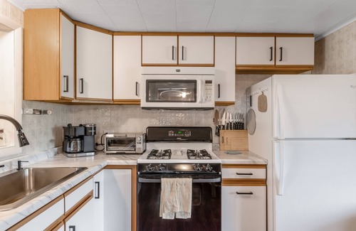 Mercer House | Lovely home with Mercer Lake view, patio, full kitchen, on trail 17