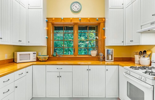Rosario House | Lovely Orcas Island craftsman-style home in a serene setting with inviting deck