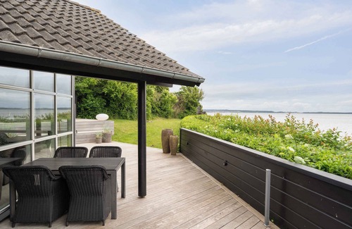 Egsmark Strand House | Lovely summer house with a view and outdoor spa.