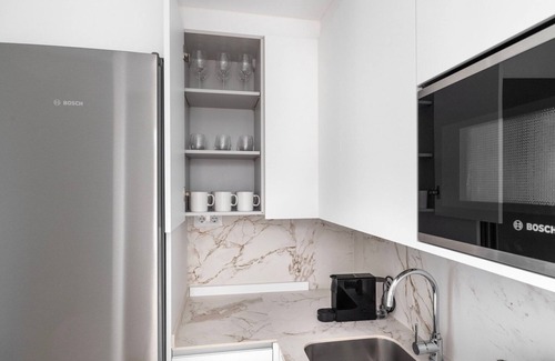 Castellana Apartment | Luxe Castellana 2BR w/Doorman, nr Restaurants, by Blueground