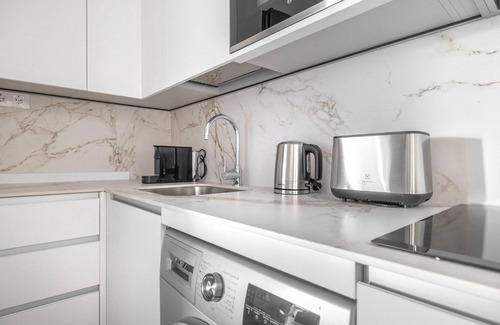 Castellana Apartment | Luxe Castellana 2BR w/Doorman, nr Restaurants, by Blueground