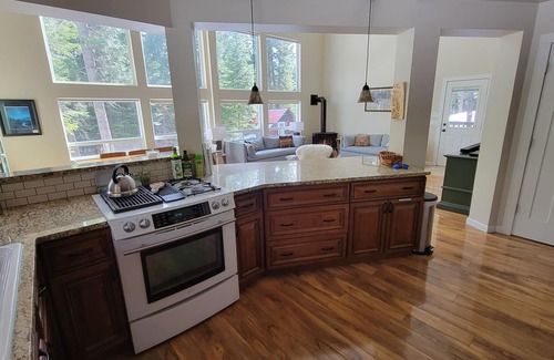 Ardenvoir House | Luxe family and pet friendly chalet in private, forested setting