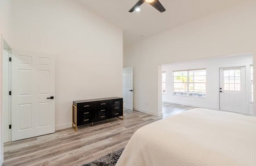 Wellington House | Luxurious 6-bedroom house with Heated Pool & Patio minutes from WEF.