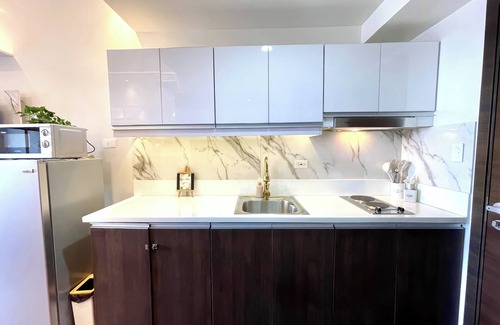 San Antonio Apartment | Luxurious White & Gold Haven in Makati
