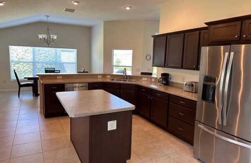 Fernandina House | Luxury 2 bed/2 bath designer home near Brownwood 2 person gas cart