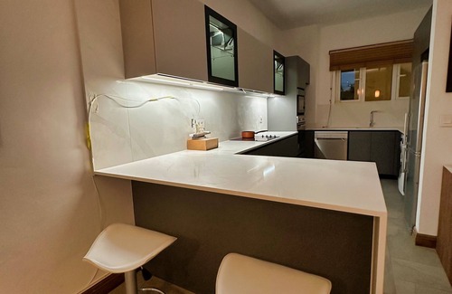 Bain Boeuf Condo | Luxury 2-Bedroom Condo with Jacuzzi Terrace, Steps from the Beach