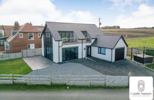 Cayton Bay Villa | Luxury 4-Bedroom Beachfront Home with Hot Tub & Games Room