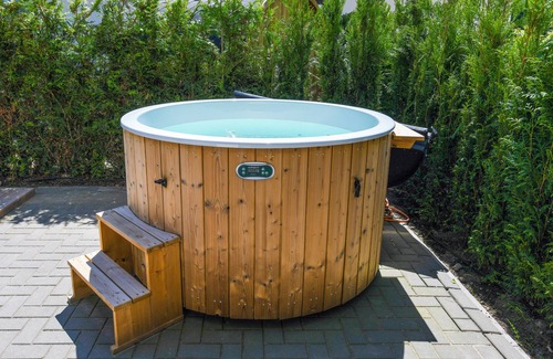 Zeewolde House | Luxury 8-person villa by the water with private jetty, hot tub and Finnish sauna. Perfect for a relaxing stay!