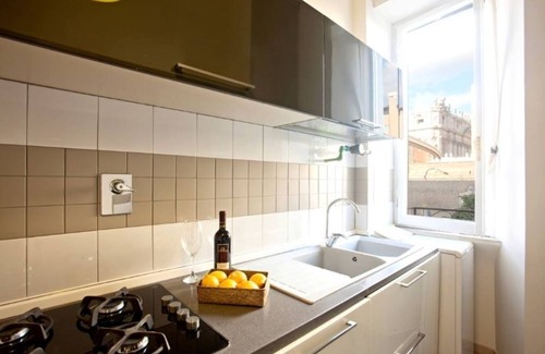 Rione XIV Borgo Apartment | Luxury Designer Rome — St. Peter Dome Views