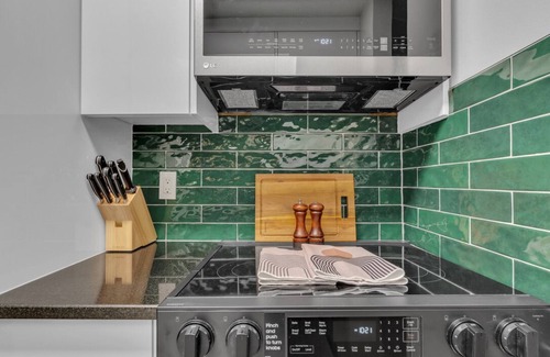 Southeast Calgary Condo | Luxury Midcentury Modern Suite - Remote Worker Focused