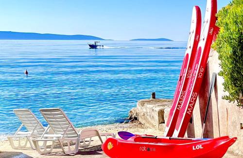 Businci Villa | Luxury Seaside Villa with a classic Mediterranean Olive Garden, a fully equipped Professional Kitchen, Pool, Sauna, Padle Boards and Canoe - Miolin Beach House