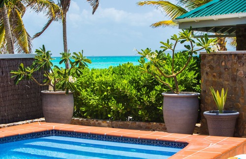 Palm Island House | Luxury Tropical Beachfront, Fully Equipped Home With Stunning Views & Amenities