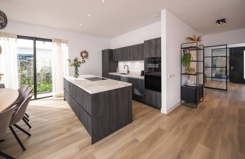 Zeewolde House | Luxury villa with 4 bedrooms and bathrooms, a south-facing roof terrace, private jetty and a stylish open kitchen. Perfect for families and groups of friends!