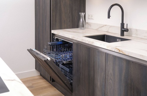 Zeewolde House | Luxury villa with 4 bedrooms and bathrooms, a south-facing roof terrace, private jetty and a stylish open kitchen. Perfect for families and groups of friends!