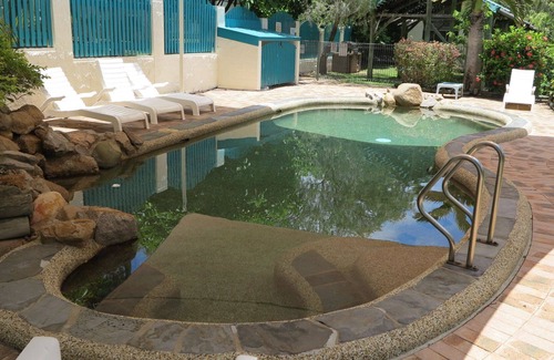 Arcadia Apartment | Magnetic Reef 3 - Relaxing tropical getaway with lush gardens and complex pool, minutes to Alma Bay
